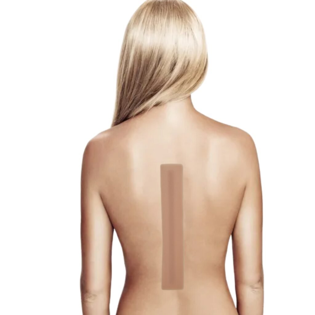 Cicatriz em pele nua nas costas de uma mulher